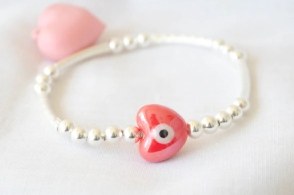 L-PU0238 Pulsera elastizada tubos bolitas corazon ojo ROJO