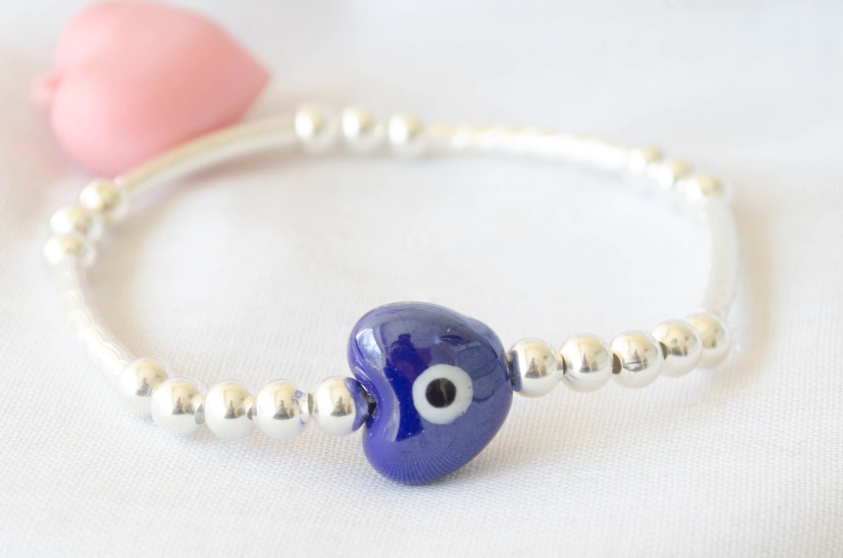 L-PU0238 Pulsera elastizada tubos bolitas corazon ojo AZUL