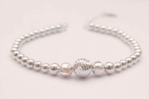 PU581 Pulsera bolitas 5mm con bola centro-18+3cm