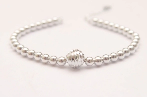 PU583 Pulsera bolitas 5mm con bola centro-17+3cm