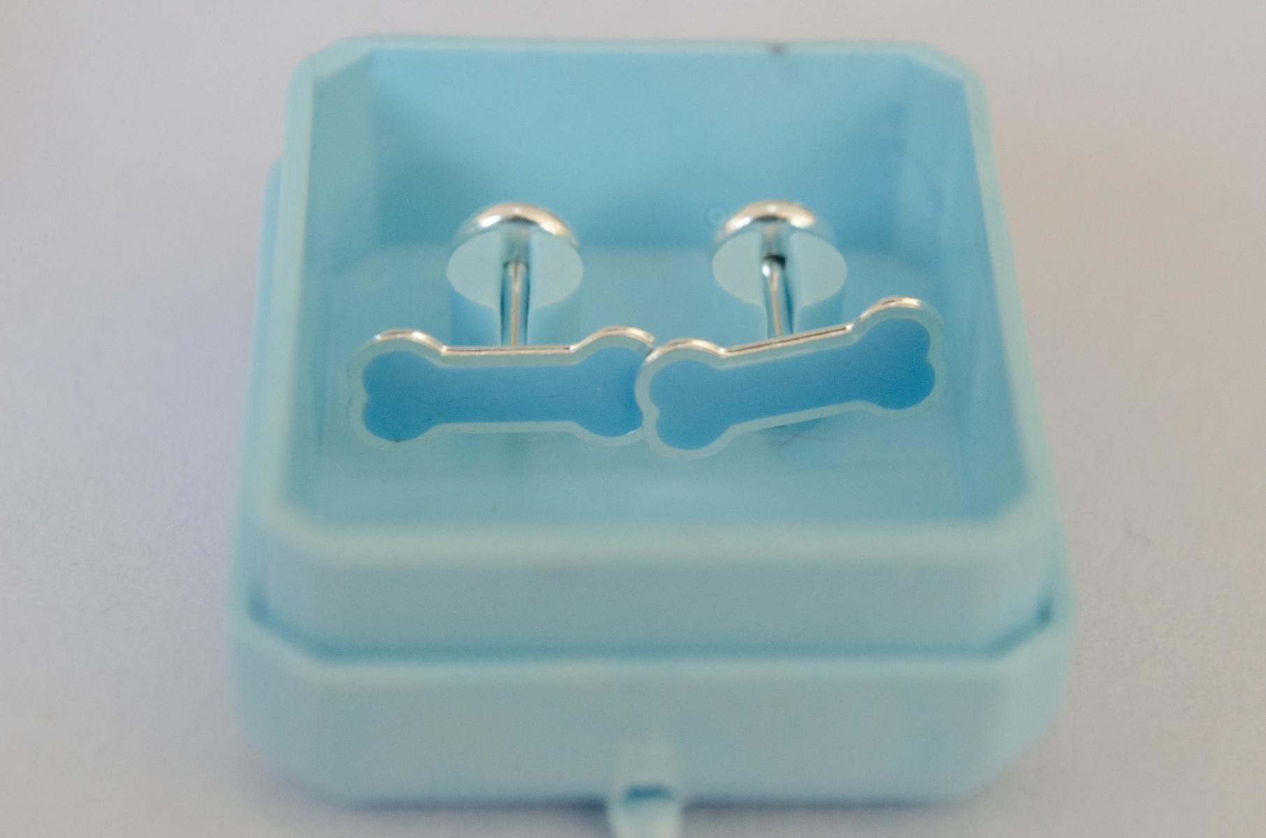 Aros abridores huesito celeste esmalte