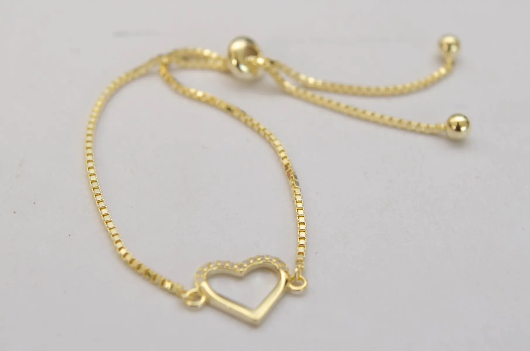 PDPU002 Pulsera PLATA DORADA tenista corazn con micropav